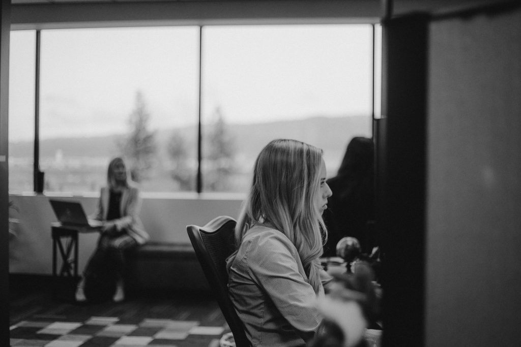 Glyph's office space showing Lauren working at her desk on a WorPress website with WPML, and Renea in the distance